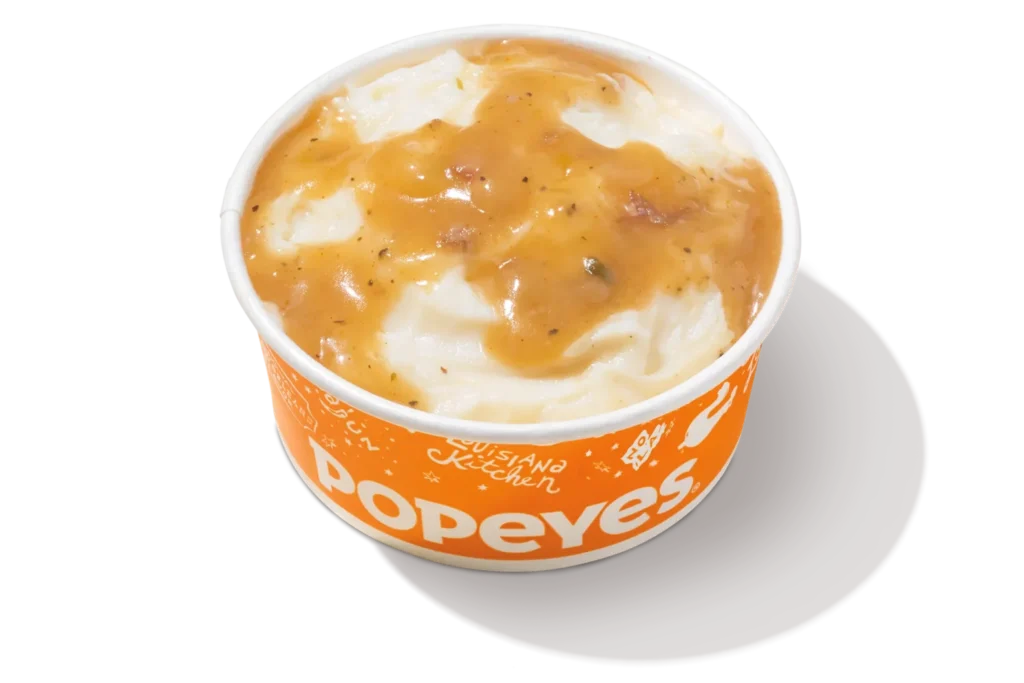 Popeyes Mashed Potatoes Price, Review & Recipe 2025 1 Popeyes mashed potatoes - menu item
